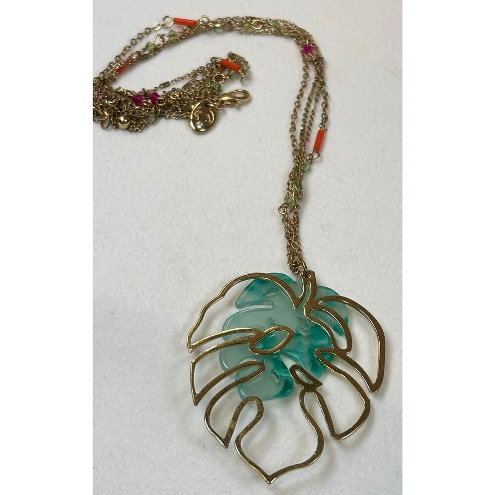 CHARMING CHARLIE Necklace 32" Gold Tone Monstera Leaf & Green Leaf Pendant